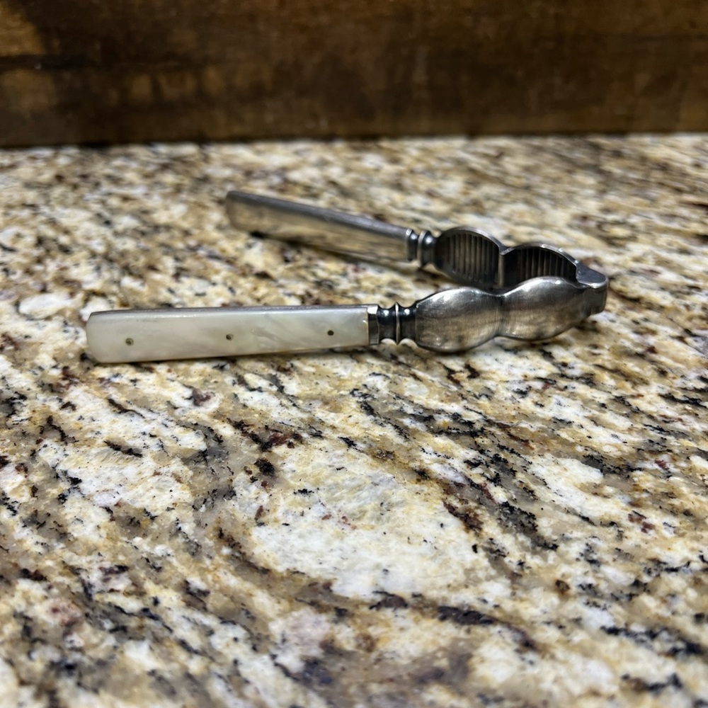 Silverplate nutcracker with mother of pearl handles silver plate